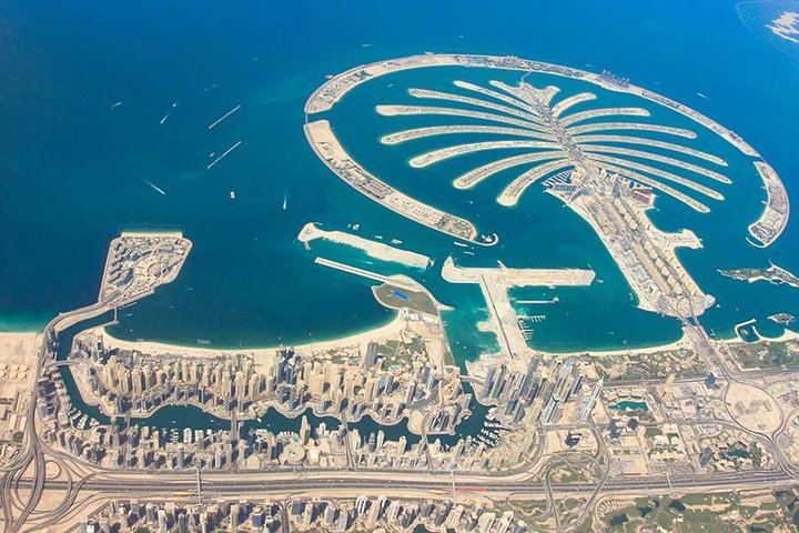 Experience the stunning transformation from desert sands to a modern marvel where innovative architecture meets the shimmering sea showcasing Dubai’s extraordinary journey through time and culture.